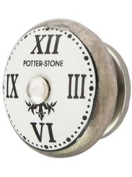 White Porcelain Clock-Face Cabinet Knob with Brass Base in Platinum Plated.